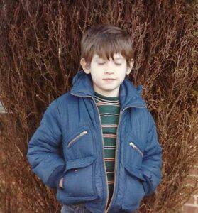 Me out front of my childhood Bowie home
